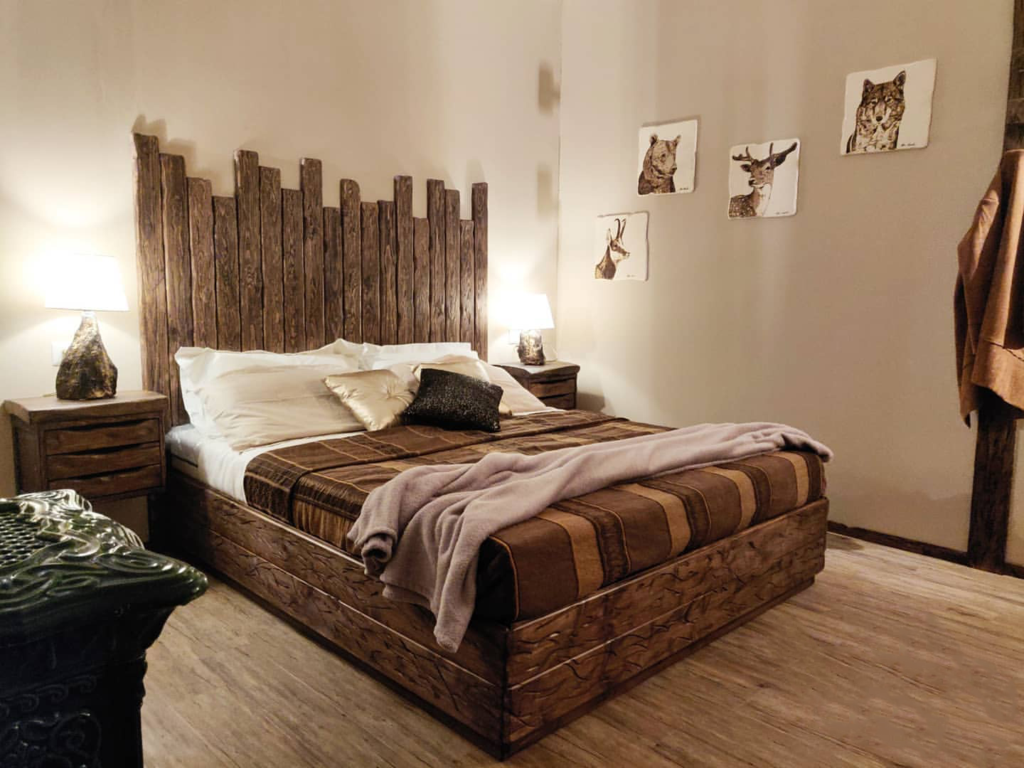 Marmotta room — rustic double bed